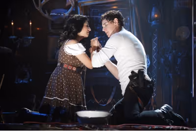 Maria Elena Ramirez and Benjamin Walker Photo
